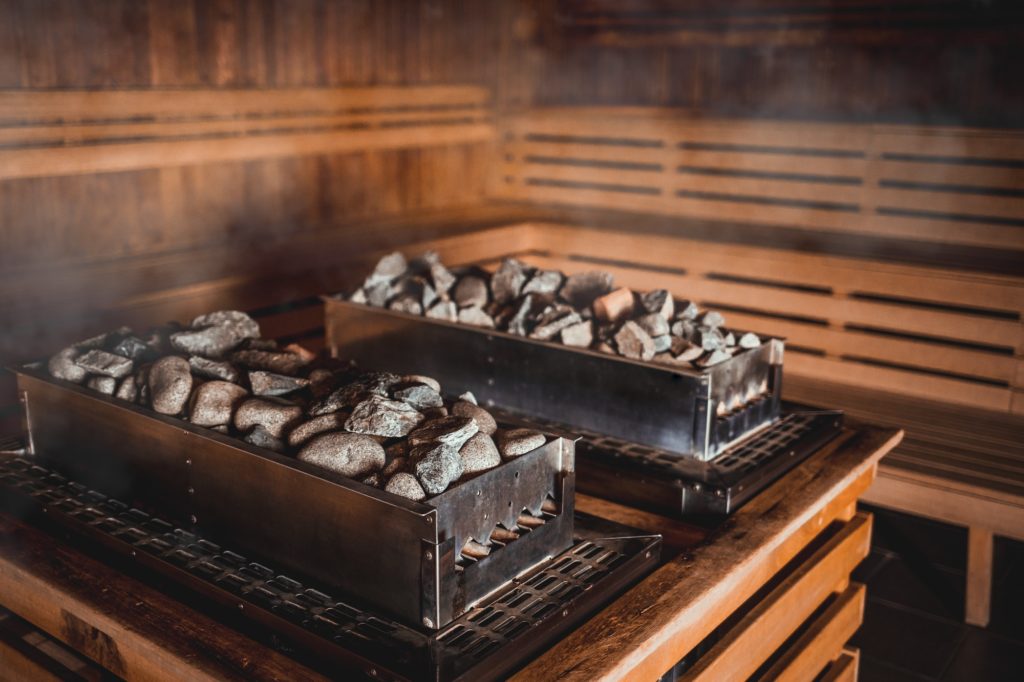 Sauna heater with hot stones