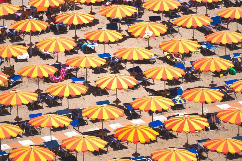 detail of umbrellas on the beach on the romagna co 6NM93UZ