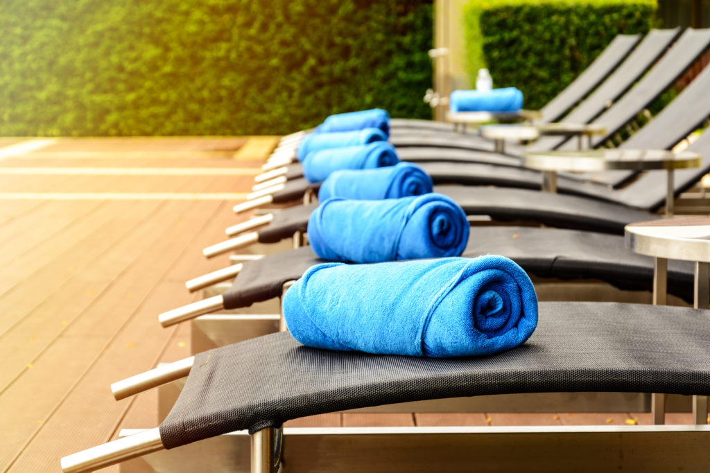 towel on sun bed at poolside 2021 10 06 09 51 03 utc
