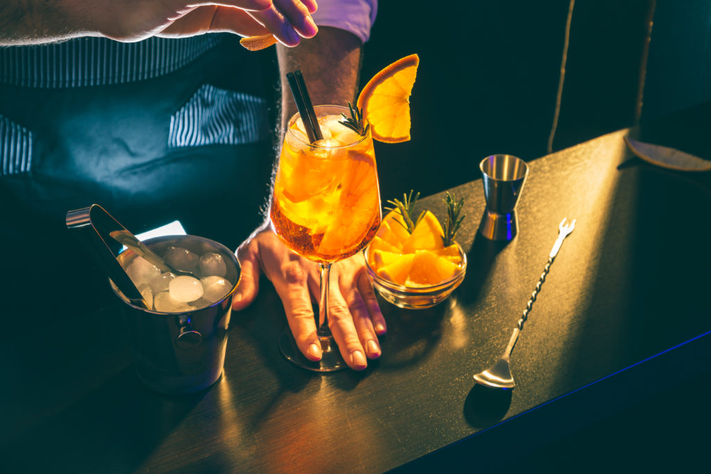 bartender making aperol spritz cocktail 2023 05 05 23 26 45 utc